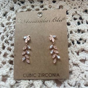 Rose gold necklace and earrings.